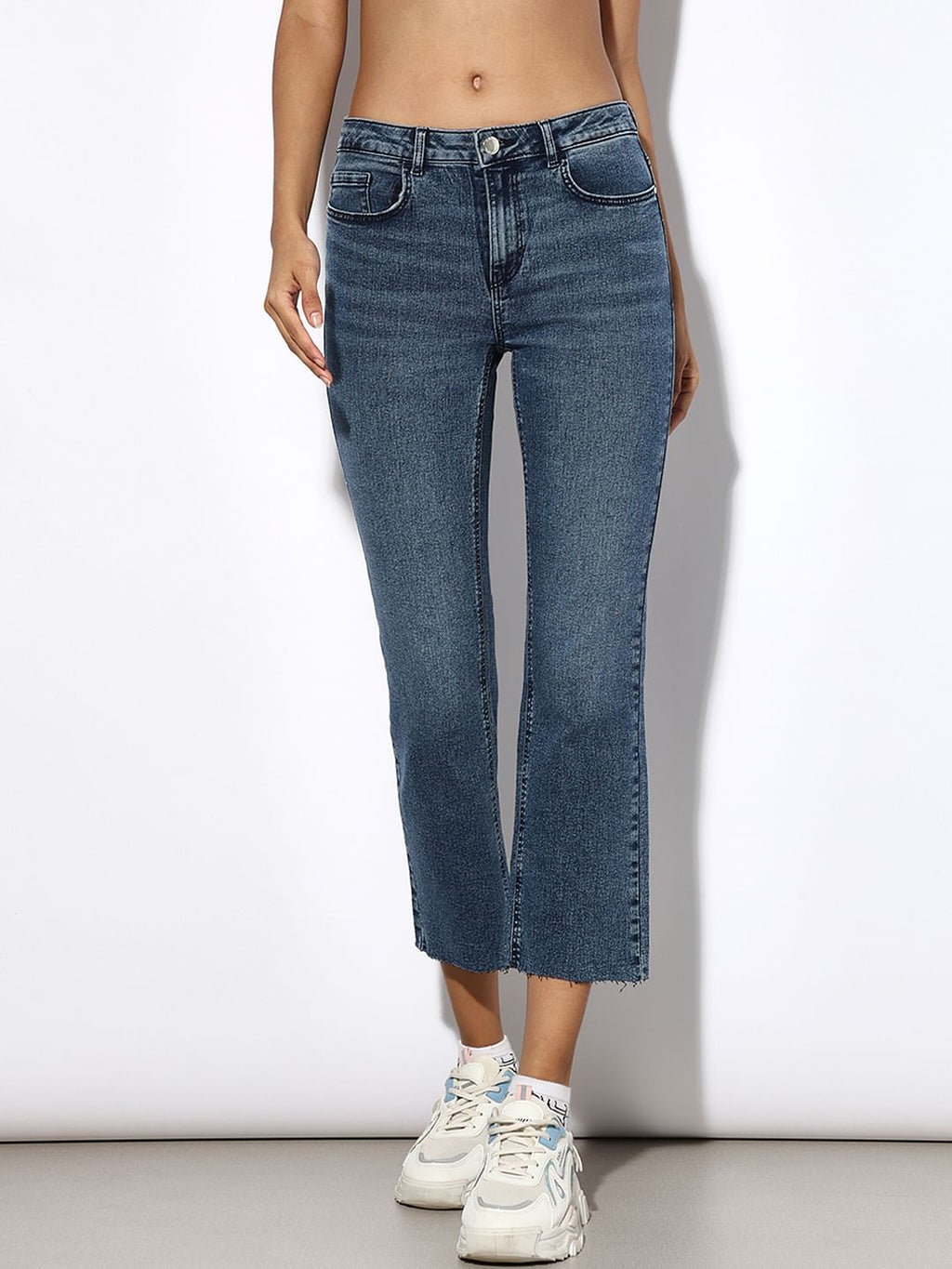 Blue Mid Rise Raw-Edge Flared Jeans
