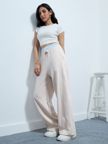 Solids: Off-White Women Flared Joggers JB65