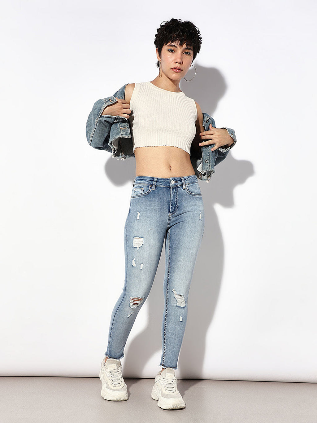 Light Blue Mid Rise Distressed Skinny Jeans