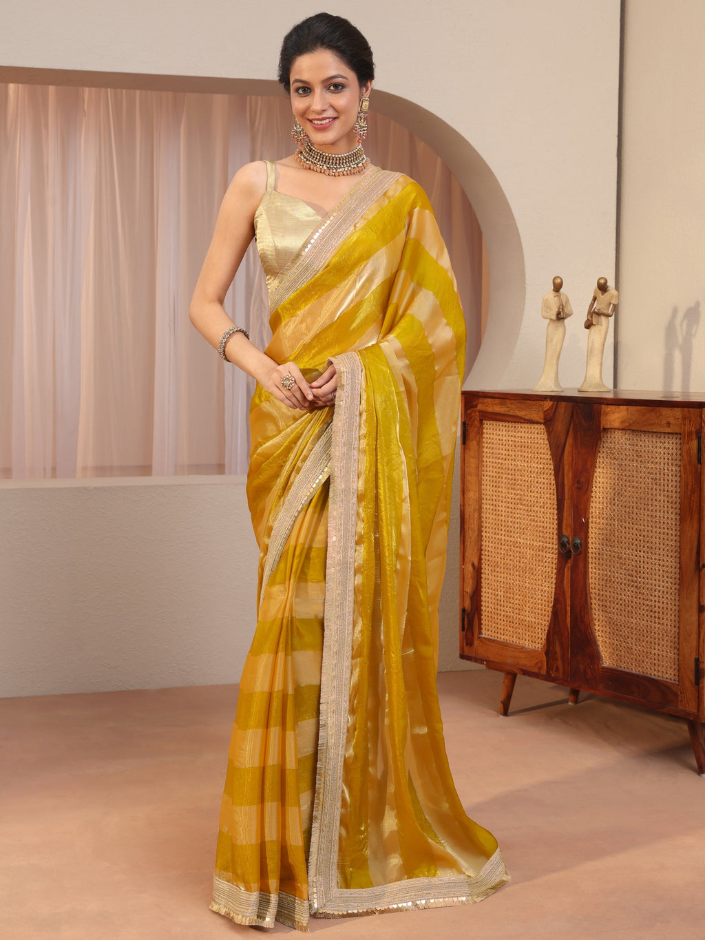 Libas Mustard Striped Textured Tissue Saree