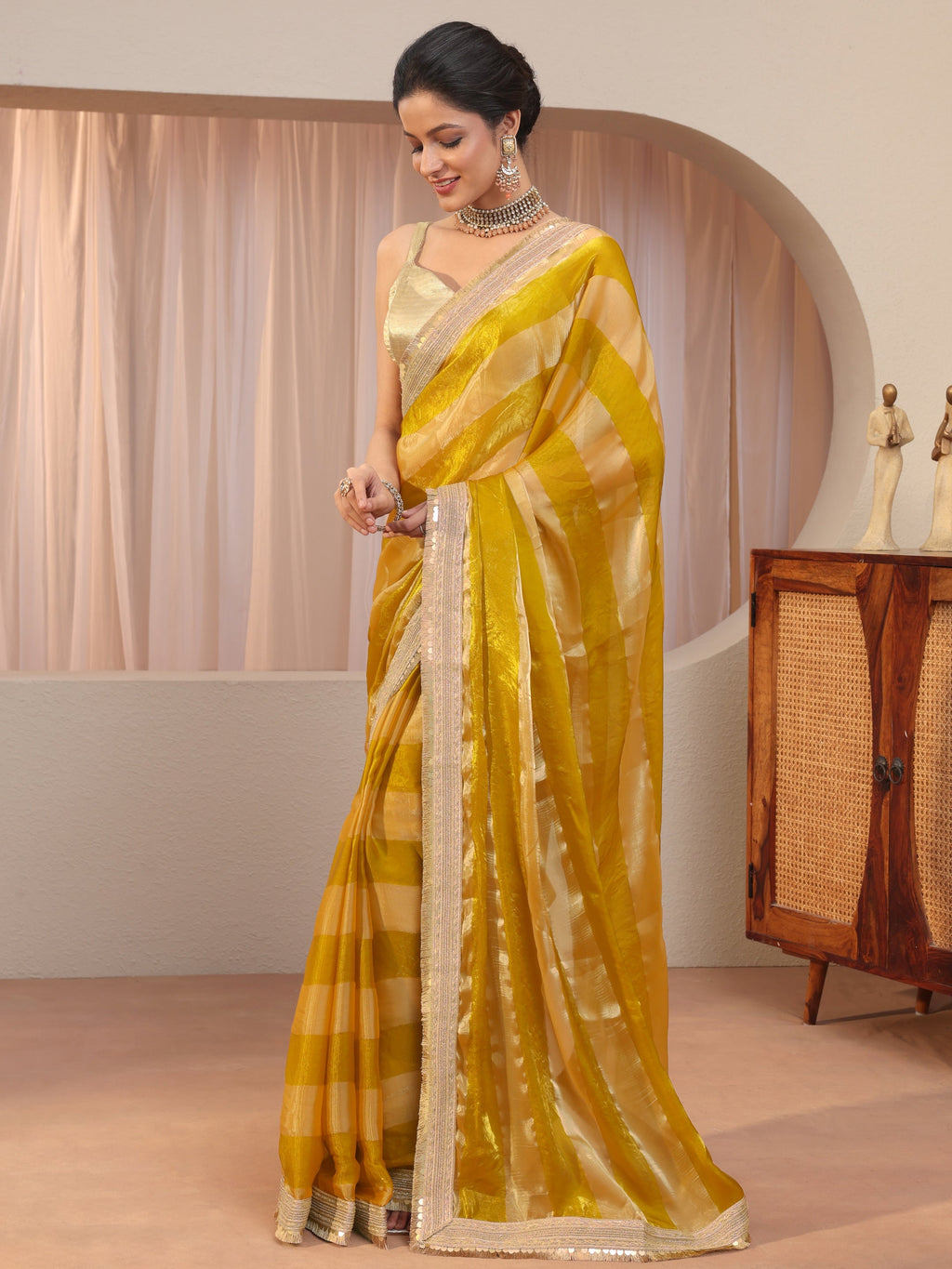 Libas Mustard Striped Textured Tissue Saree