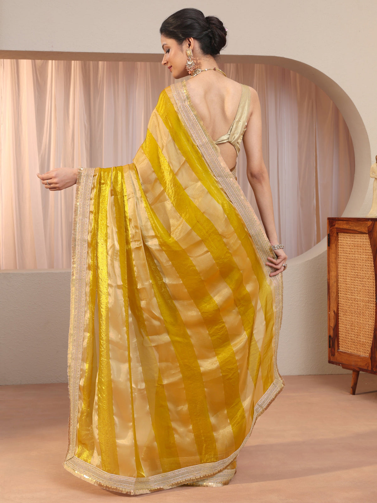 Libas Mustard Striped Textured Tissue Saree