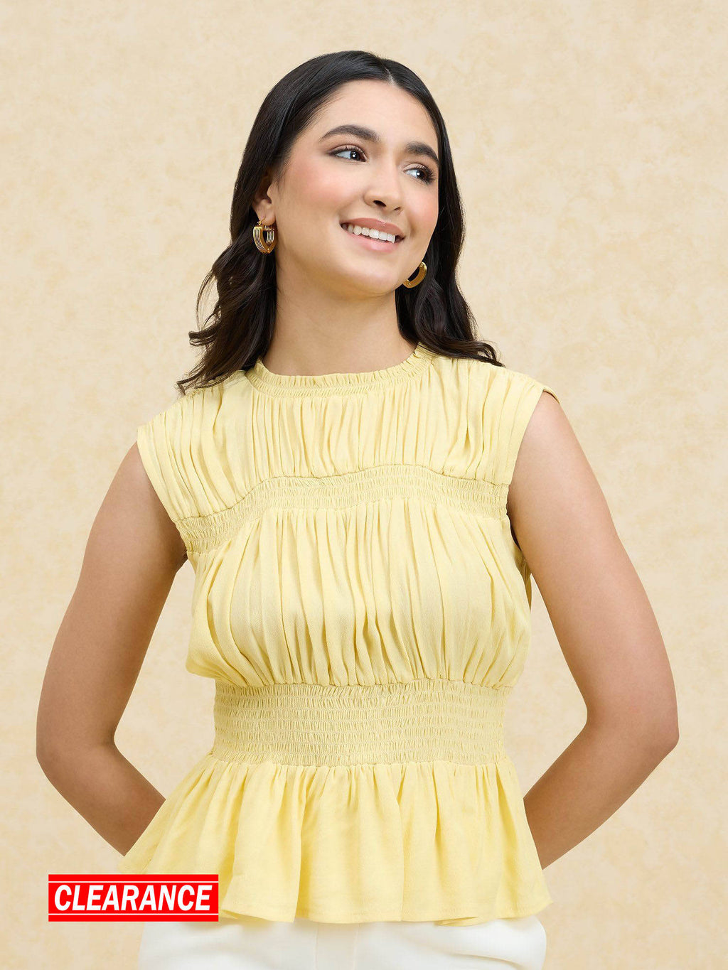 Yellow Solid Smocked Sleeveless Peplum Top | pt51 - view 1