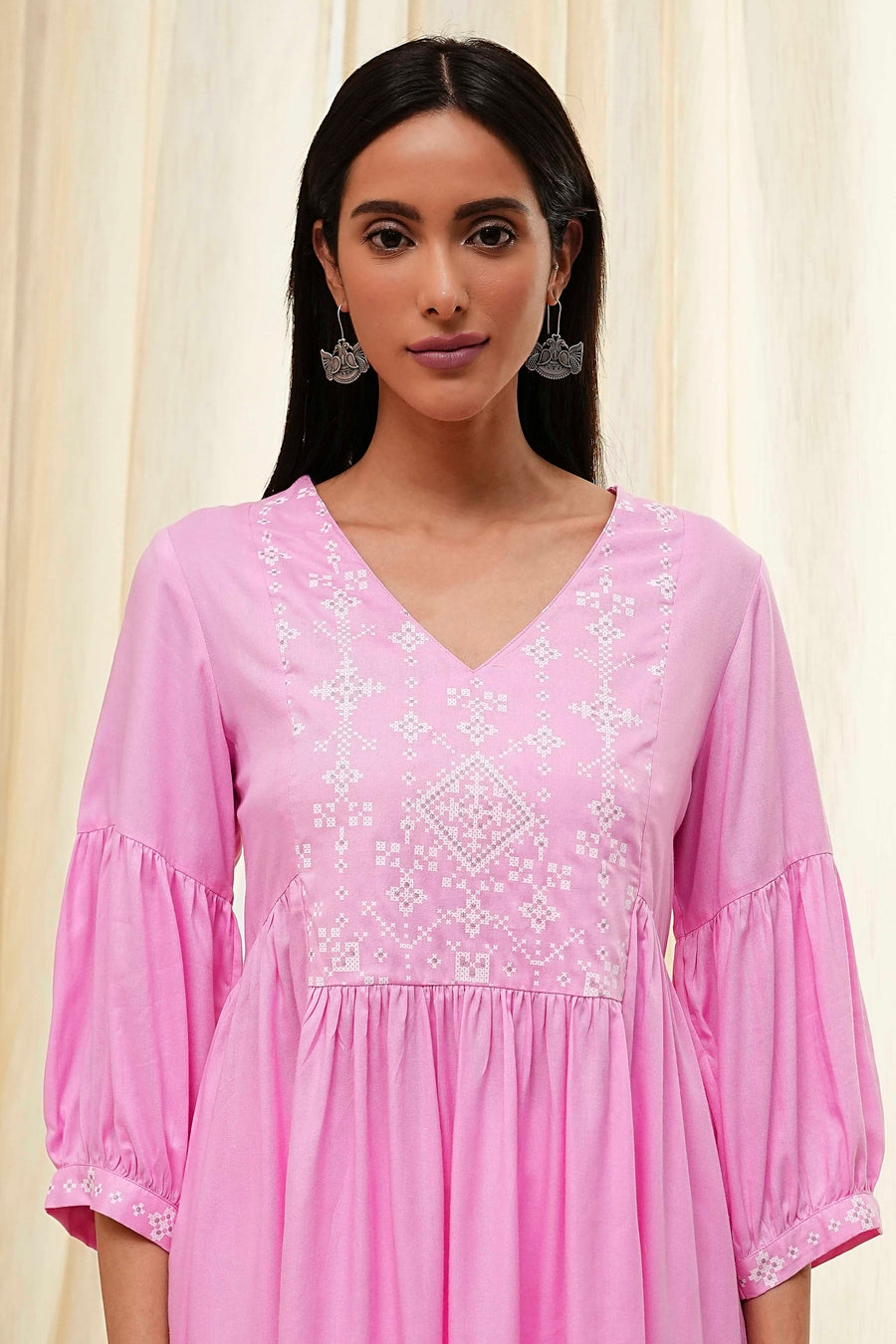 Pink Solid Flared Short Kurta K60