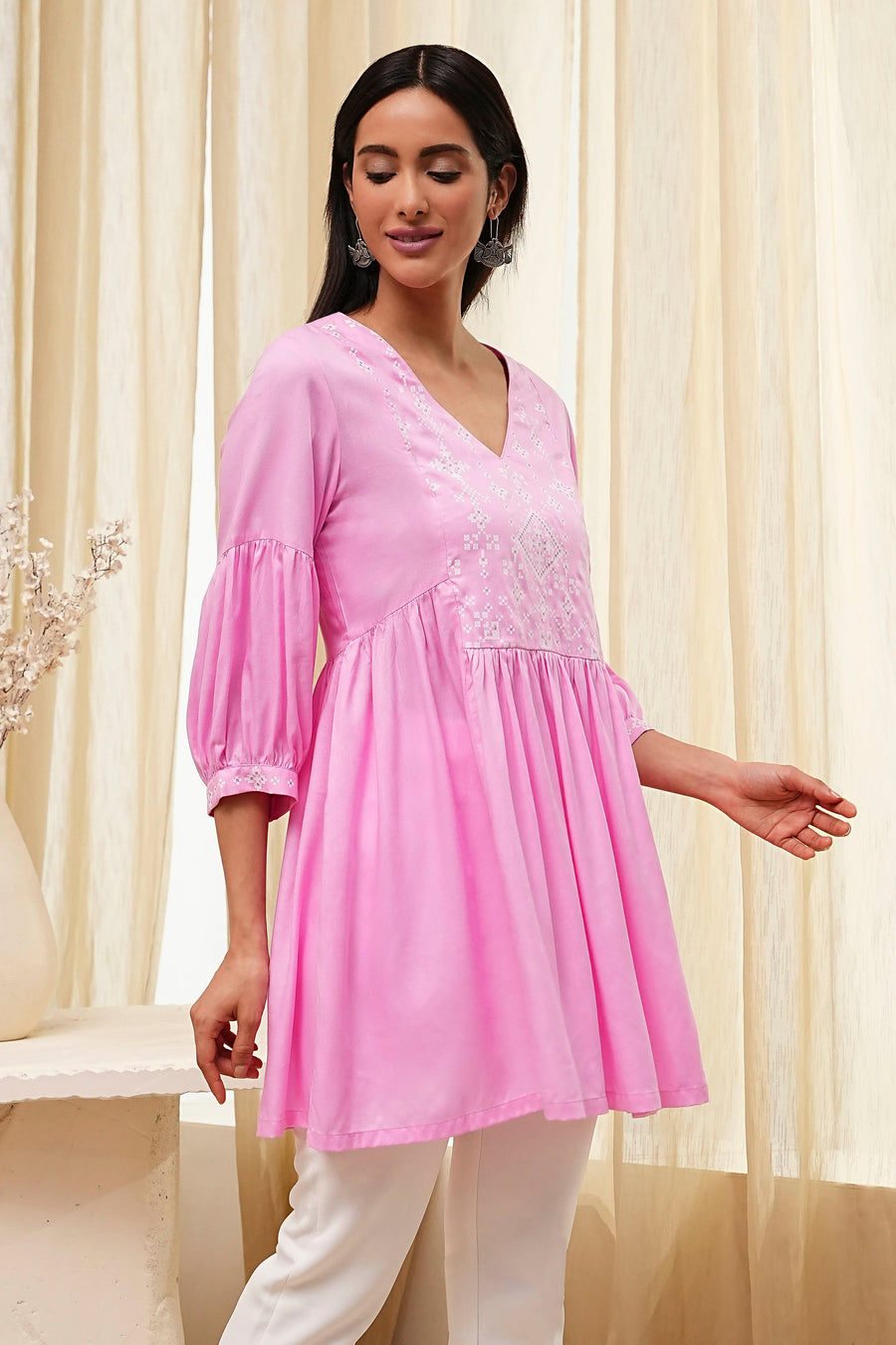 Pink Solid Flared Short Kurta K60